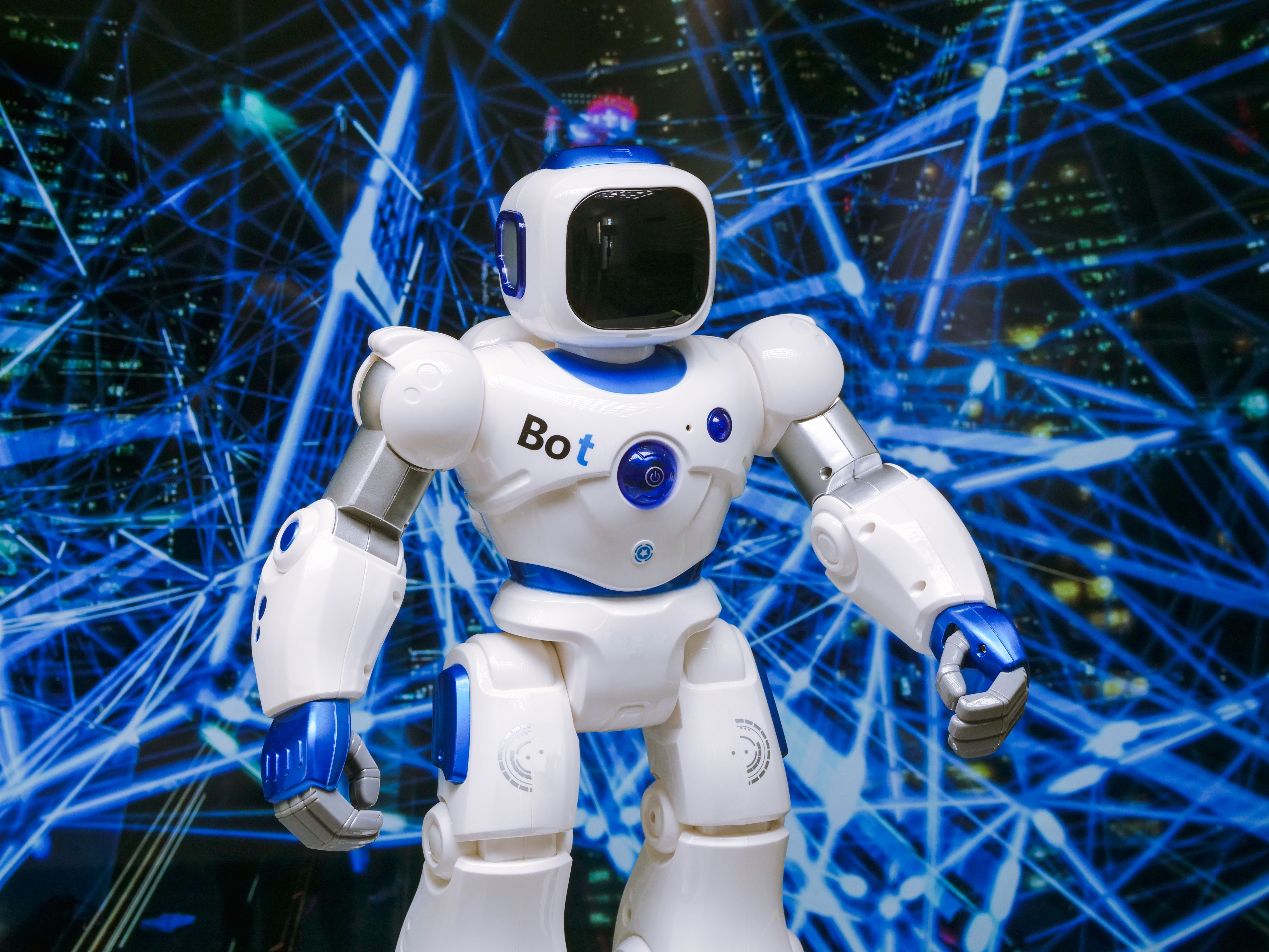 Futuristic humanoid robot with glowing blue accents symbolizing AI writing tools like ChatGPT
